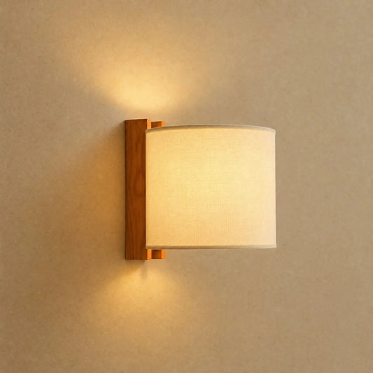 Blyne solid wood wall light, Drum model with ecru fabric shade | Wickleigh