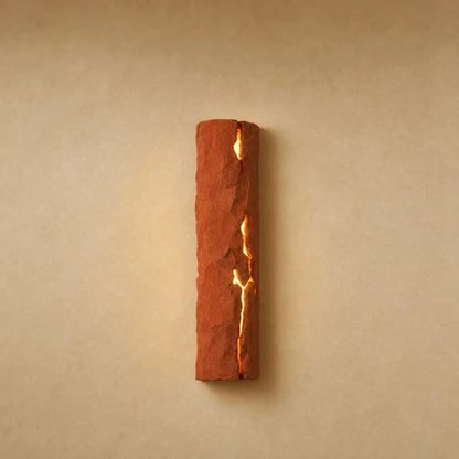 Brevna lava stone effect wall light with luminous fissure, Terracotta finish | Wickleigh