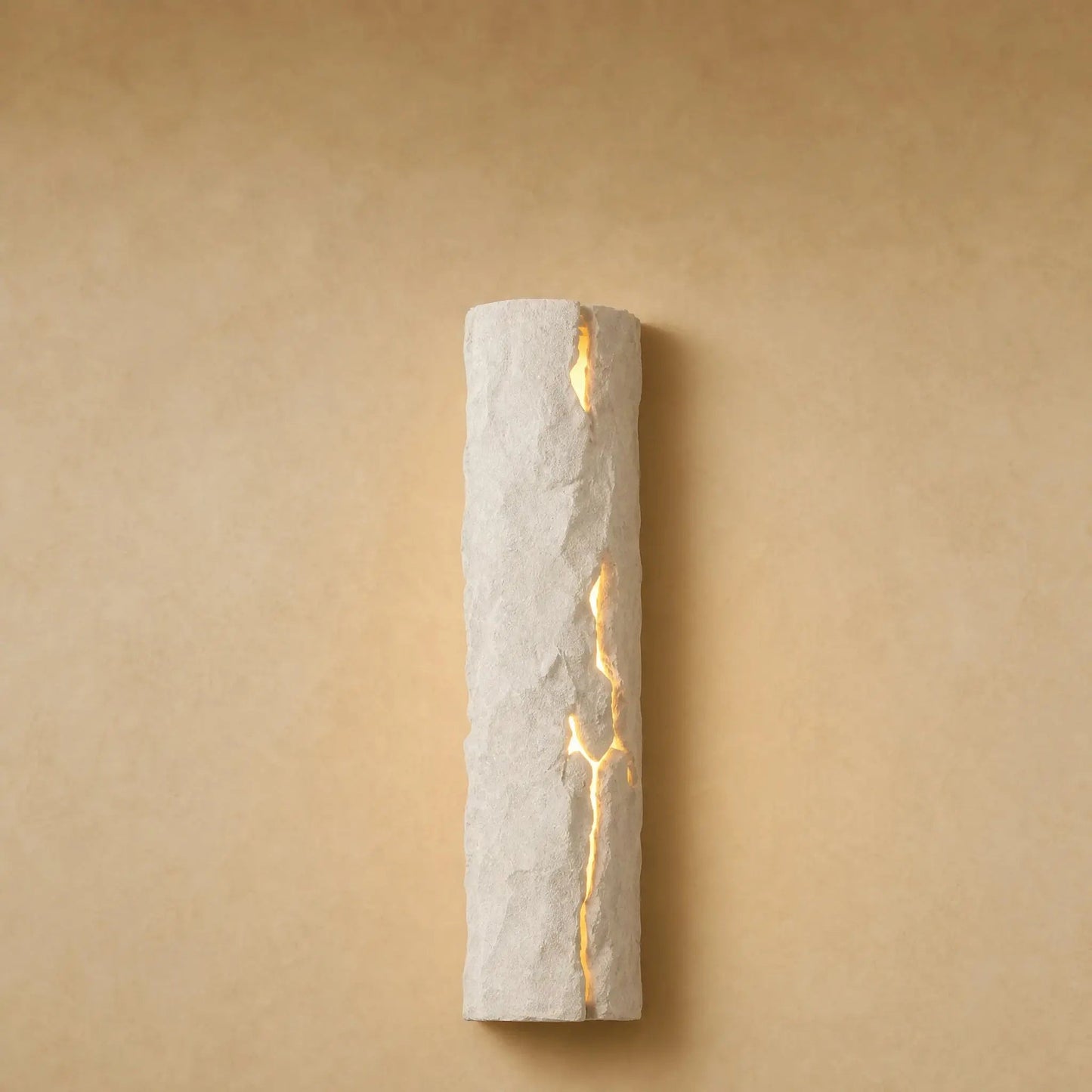 Brevna lava stone effect wall light with luminous fissure, Light Stone finish | Wickleigh