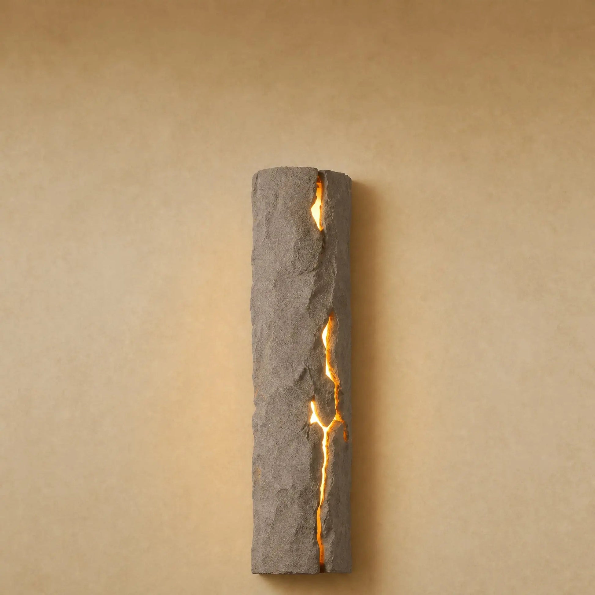 Brevna lava stone effect wall light with luminous fissure, Stone Grey finish | Wickleigh