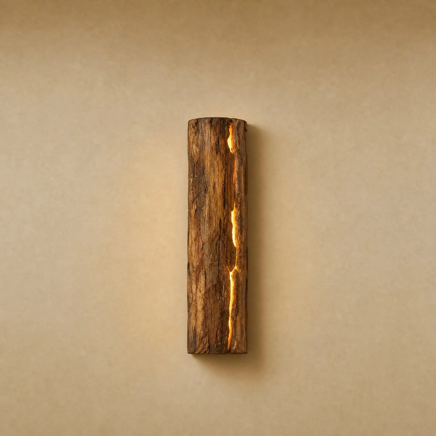Brevna wall light, Raw Wood finish with luminous fissure, bark-like texture | Wickleigh