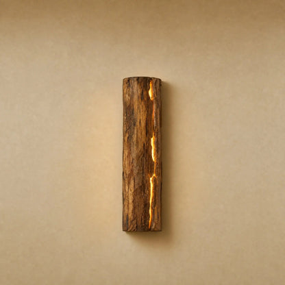 Brevna wall light, Raw Wood finish with luminous fissure, bark-like texture | Wickleigh