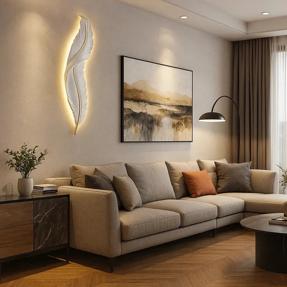Cavlen feather wall light, gold-edged resin silhouette | Wickleigh
