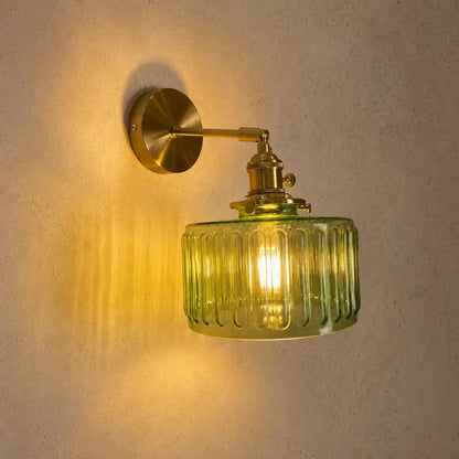 Daglen green glass wall light, brass arm on wood base | Wickleigh