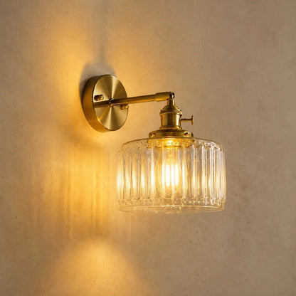 Daglen green glass wall light, brass arm on wood base | Wickleigh