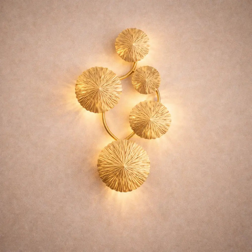 Alova wall light, gilded stainless steel lotus leaves | Wickleigh