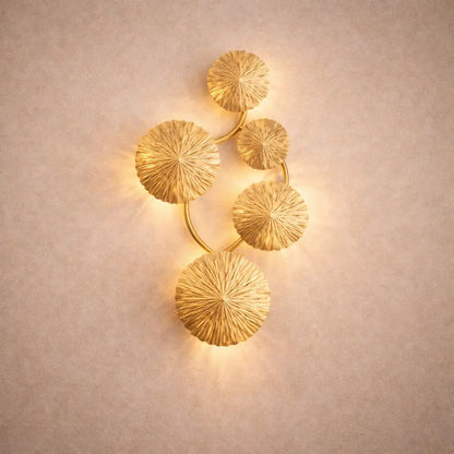 Alova wall light, gilded stainless steel lotus leaves | Wickleigh