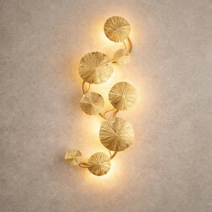 Alova wall light, gilded stainless steel lotus leaves | Wickleigh