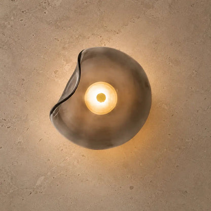 Covna glass pebble wall light, organic sculpted shape | Wickleigh