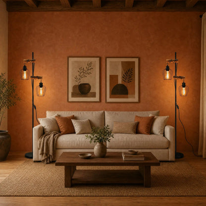 Two matching Telna industrial floor lamps framing a sofa | Wickleigh