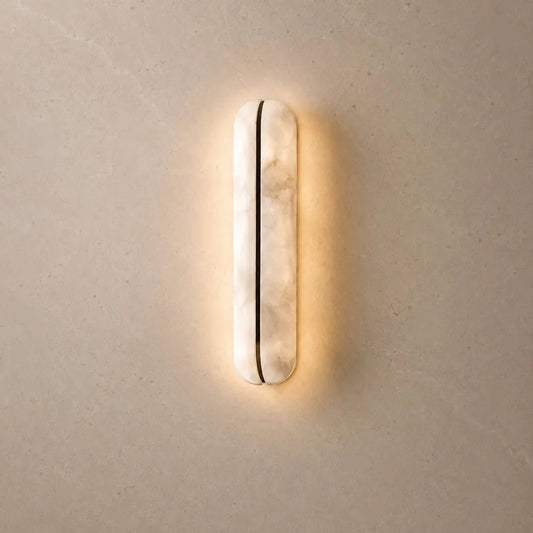 Welna wall light, vertical marble-effect column | Wickleigh