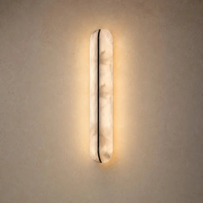 Welna wall light, vertical marble-effect column | Wickleigh