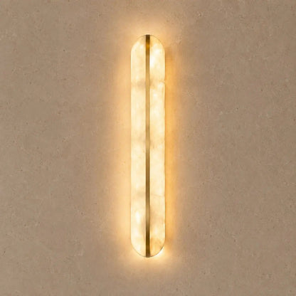 Welna wall light, vertical marble-effect column | Wickleigh