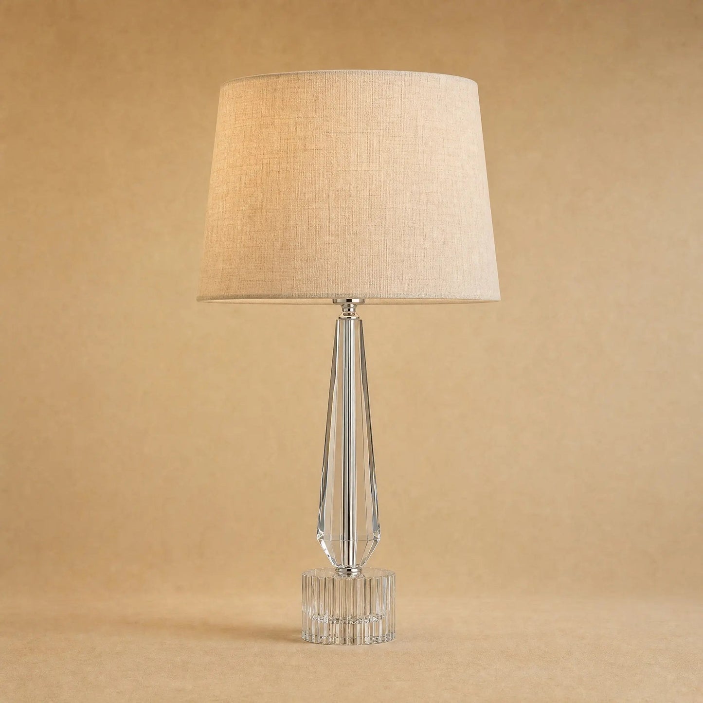 Malna crystal bedside lamp, faceted spindle with natural linen shade | Wickleigh