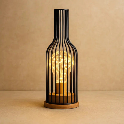 Ylova wrought iron lamp, wine bottle style, packshot | Wickleigh