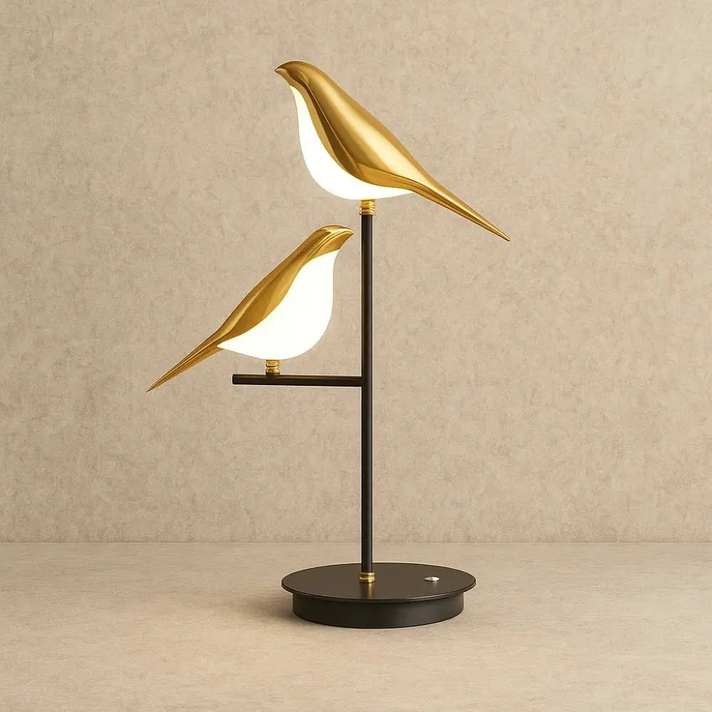 Erlin sculptural gold bird desk lamp, natural light setting | Wickleigh
