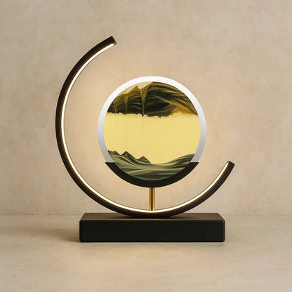 Rilva moving sand art desk lamp, black frame with black sand | Wickleigh