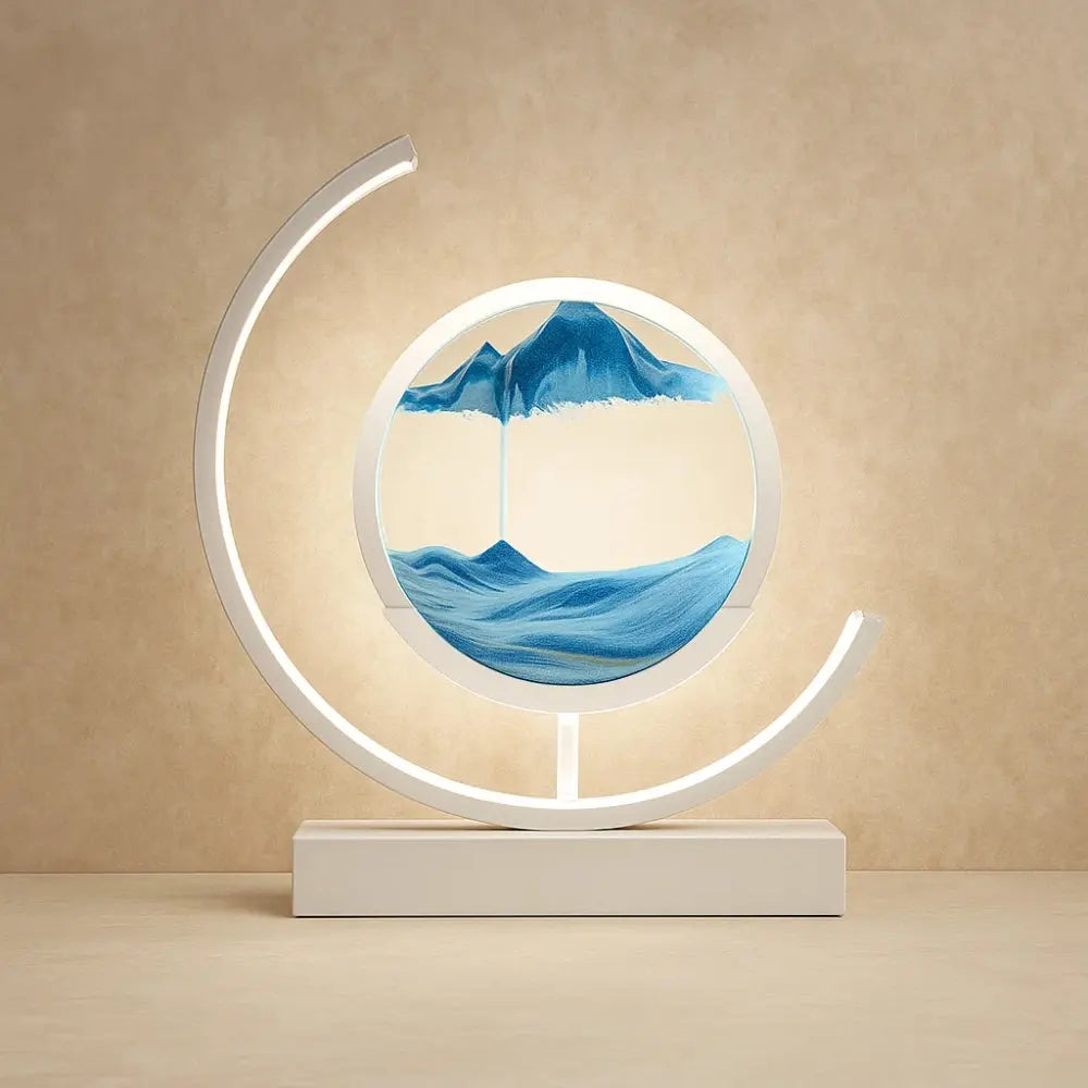Rilva moving sand art desk lamp, white frame with blue sand | Wickleigh
