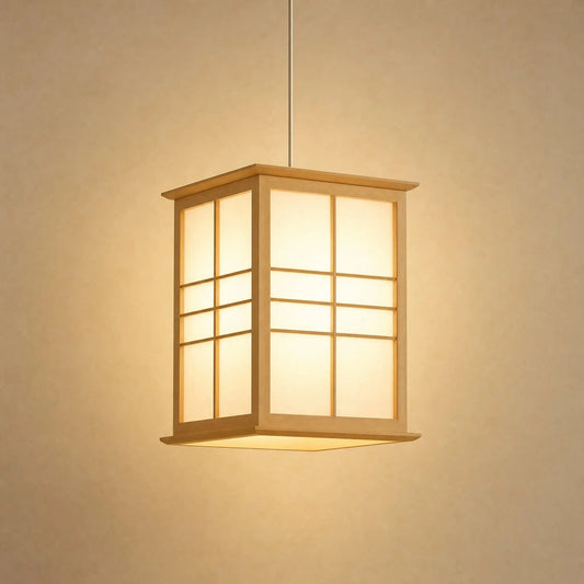 Norla Japanese pendant light in solid pine, shoji-style panels, on a beige mineral backdrop | Wickleigh