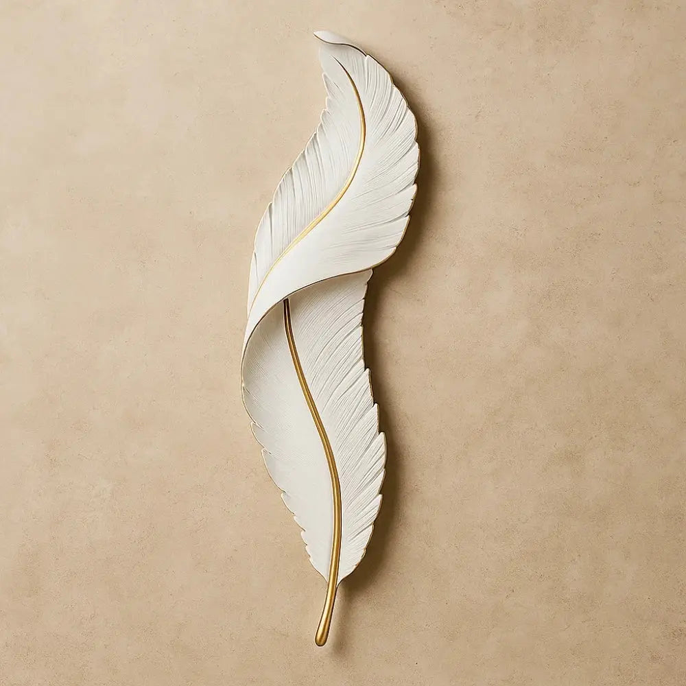 Cavlen feather wall light, gold-edged resin silhouette | Wickleigh