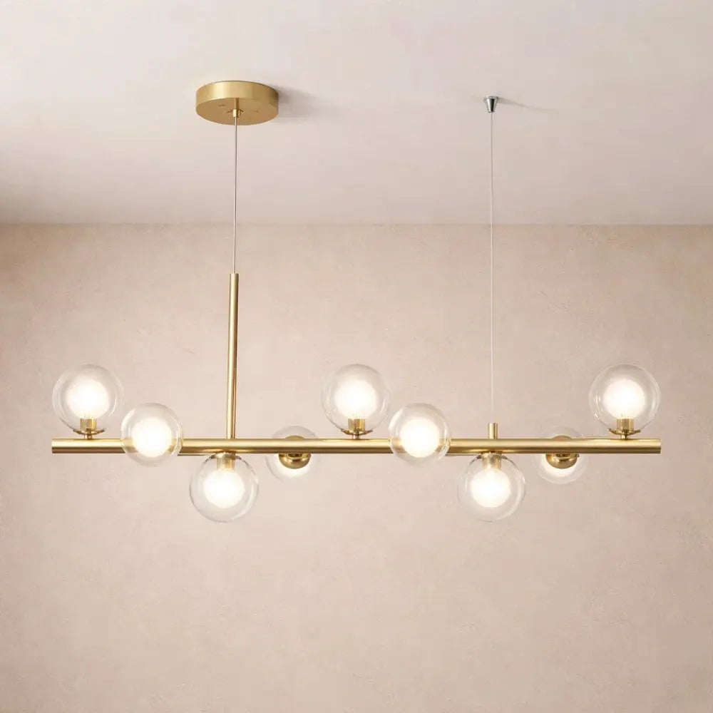 Odvin linear pendant light, glass globe row above dining table, packshot | Wickleigh