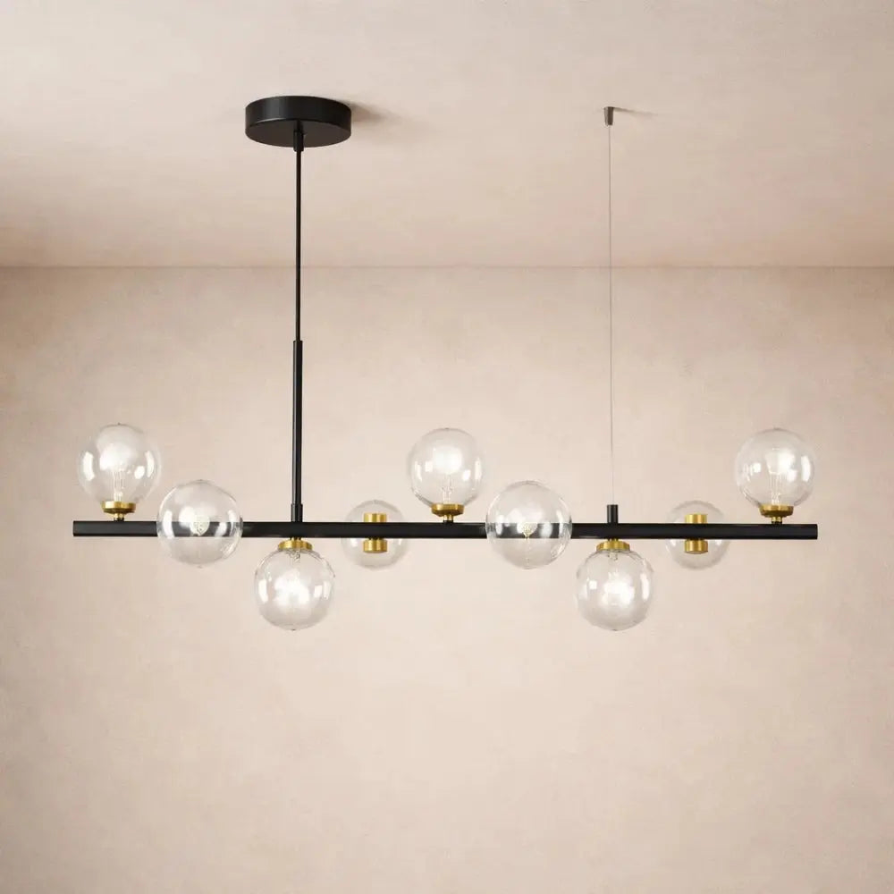 Odvin linear pendant light, glass globe row above dining table, packshot | Wickleigh