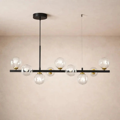 Odvin linear pendant light, glass globe row above dining table, packshot | Wickleigh