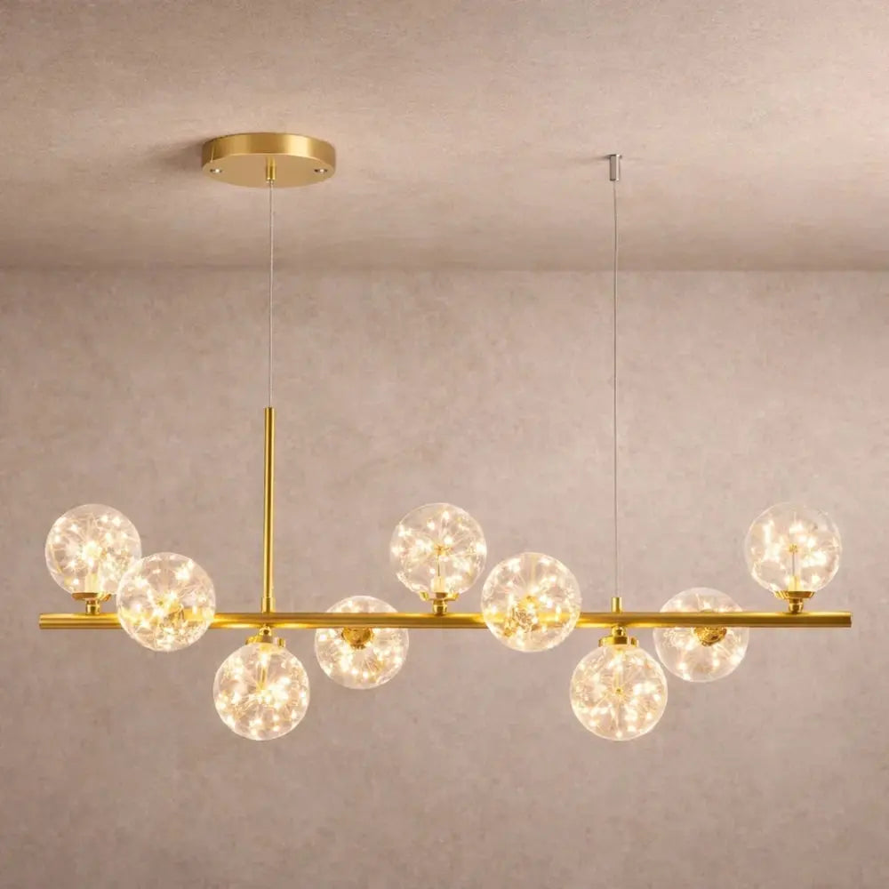 Odvin linear pendant light, glass globe row above dining table, packshot | Wickleigh