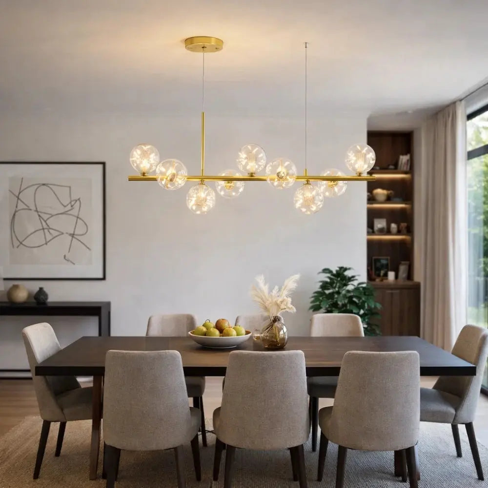 Odvin linear pendant light, glass globe row above dining table, packshot | Wickleigh