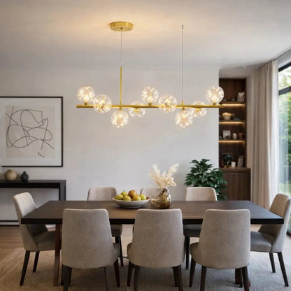 Odvin linear pendant light, glass globe row above dining table, packshot | Wickleigh