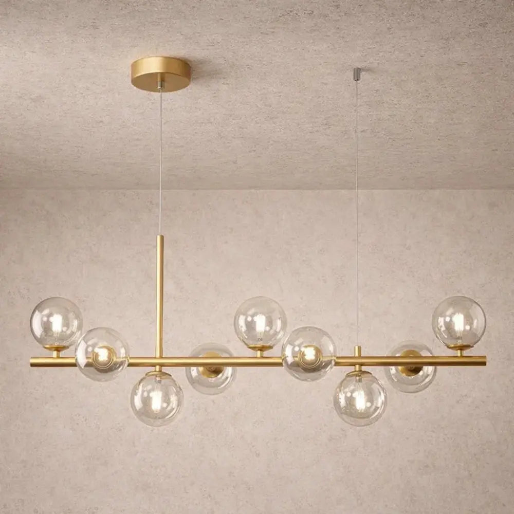 Odvin linear pendant light, glass globe row above dining table, packshot | Wickleigh