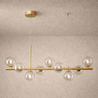 Odvin linear pendant light, glass globe row above dining table, packshot | Wickleigh