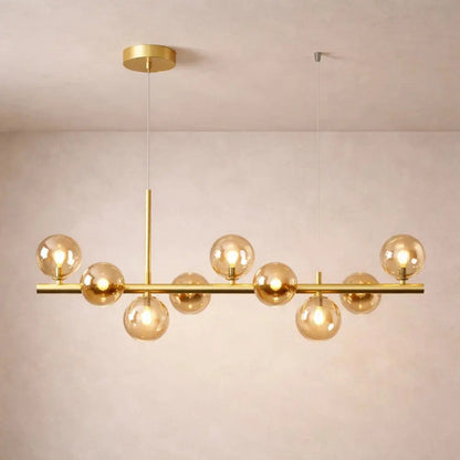 Odvin linear pendant light, glass globe row above dining table, packshot | Wickleigh