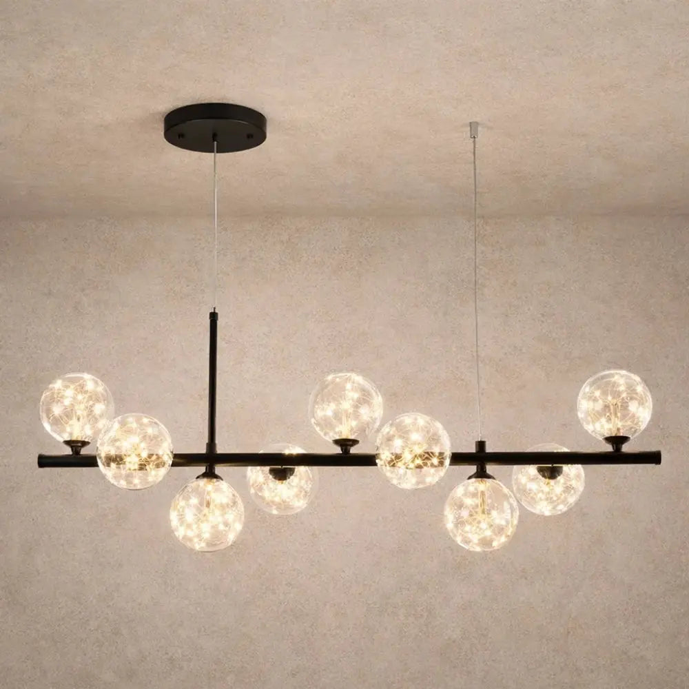 Odvin linear pendant light, glass globe row above dining table, packshot | Wickleigh