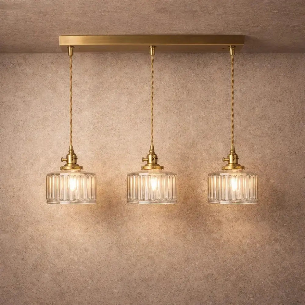 Ingin ribbed glass pendant light, gold cylinder, packshot | Wickleigh