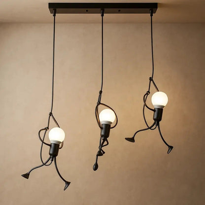 Vadna sculptural figure pendant light, three figures in a line, cool white | Wickleigh