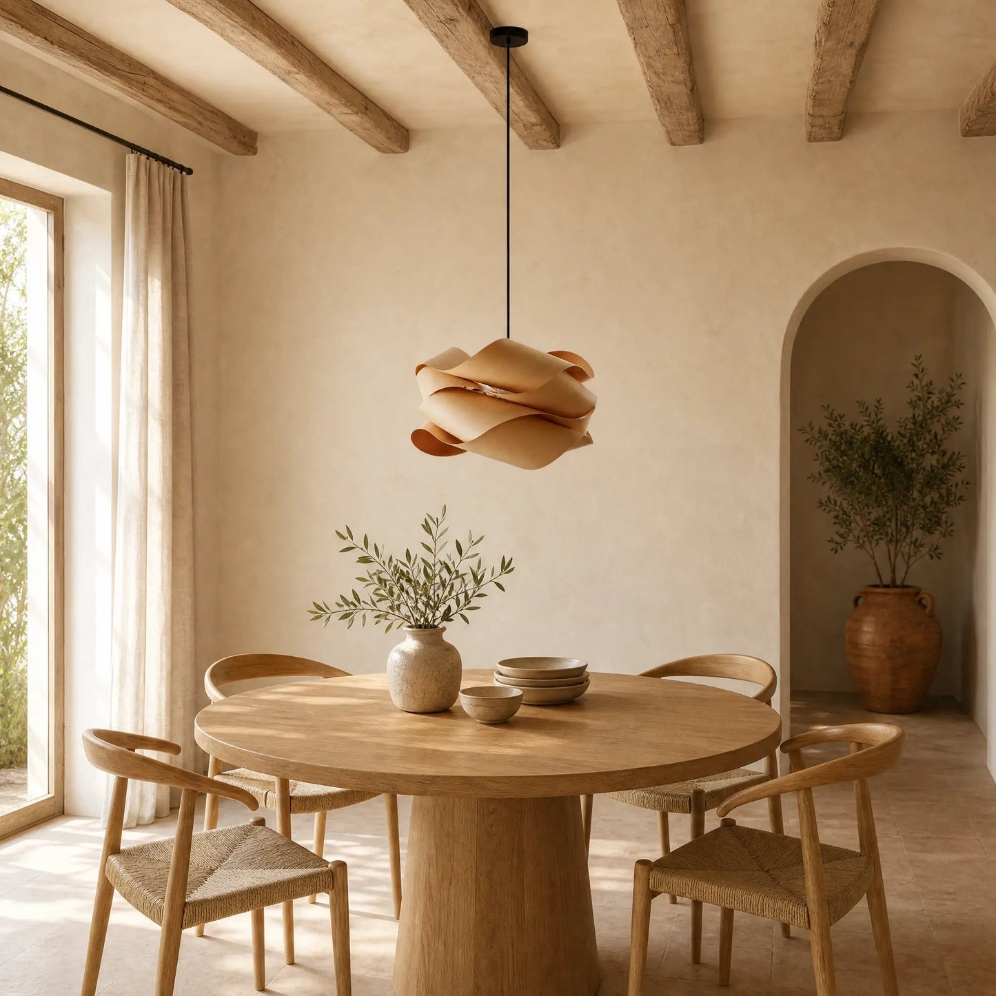 Vinin wood cloud pendant light above a round oak table in a dining room | Wickleigh