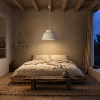 Velra chandelier lit above the bed in a wabi-sabi bedroom at dusk | Wickleigh