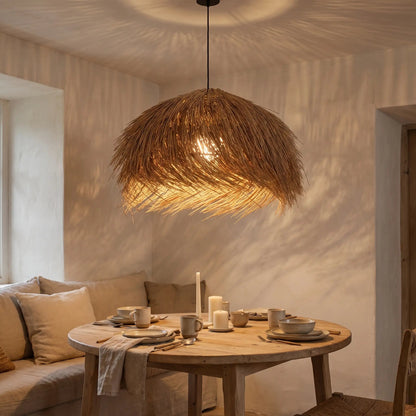 Vadra rattan pendant light, evening dining room scene | Wickleigh