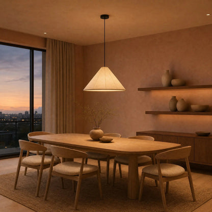 Dovra paper pendant light lit above a Japandi dining table | Wickleigh