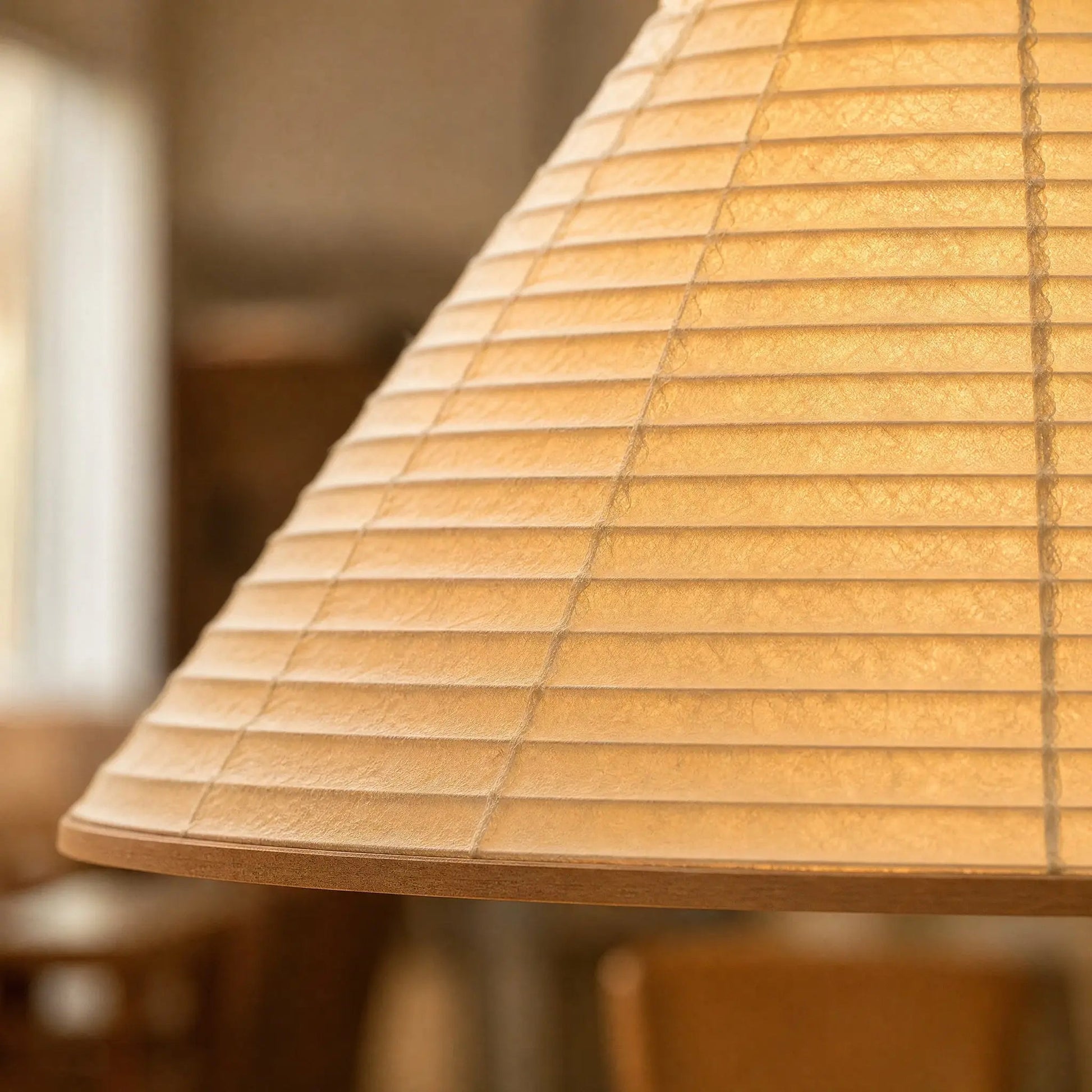Detail of the pleated translucent rice paper on the Dovra pendant light | Wickleigh