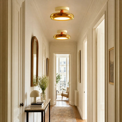 Two Aswyn amber ceiling lights aligned along a hallway | Wickleigh