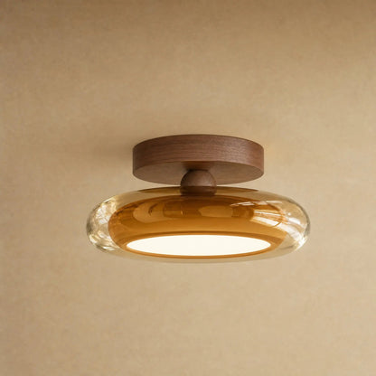 Aswyn ceiling light in amber glass with walnut-effect base plate, glass pebble | Wickleigh