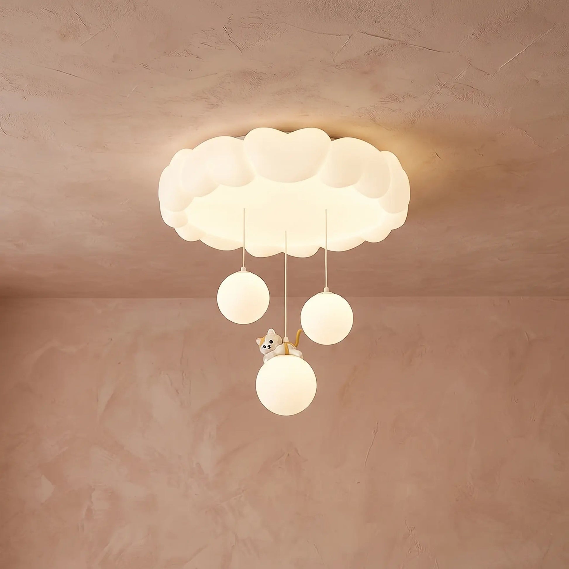 Sennra clouds ceiling light, installed and lit, pink-beige plaster background | Wickleigh