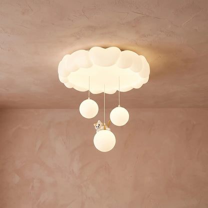 Sennra clouds ceiling light, installed and lit, pink-beige plaster background | Wickleigh