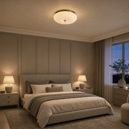 Hilra ceiling light lit in a contemporary greige bedroom at dusk | Wickleigh