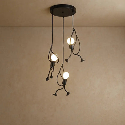Vadna sculptural figure pendant light, three figures in a circle, cool white | Wickleigh