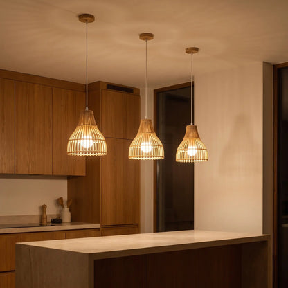 Edika bamboo kitchen pendant light, trio above the island in the evening | Wickleigh