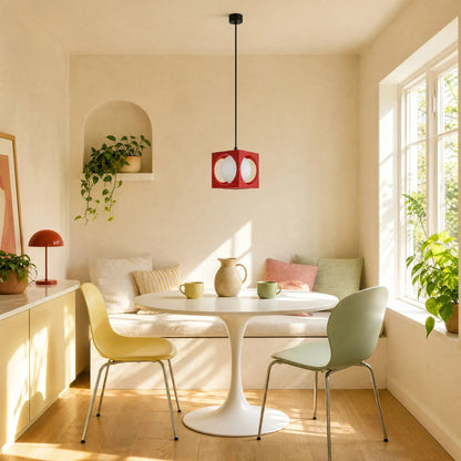 Asina red pendant light above a round table in a sunlit dining corner | Wickleigh