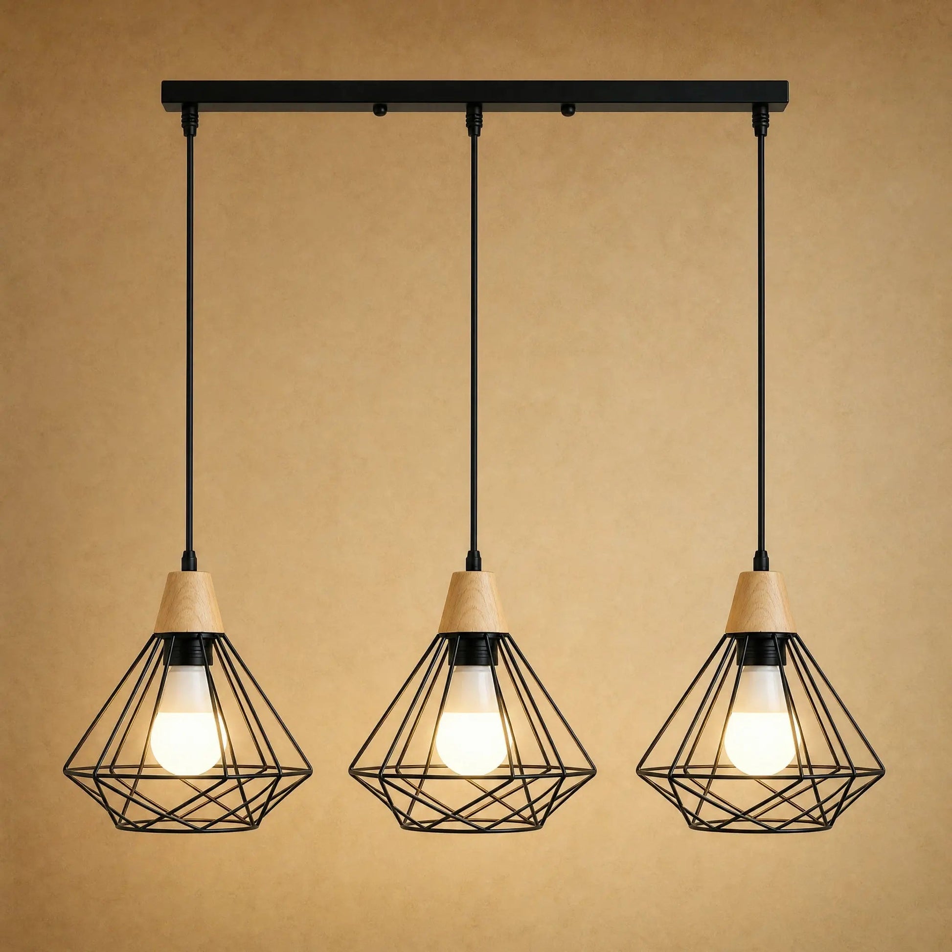 Fyrra industrial pendant light, three heads aligned, black iron diamond cage and light wood | Wickleigh